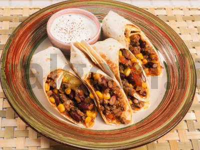 Burrito su malta mėsa ir pupelėmis pagrindine nuotrauka