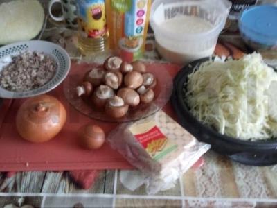 Konservuotas žuvies pyragas su kopūstais, grybais ir sūriu Žingsnis 1