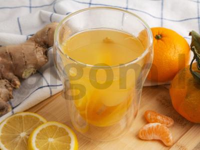 Gėrimas su mandarinais ir imbieru pagrindine nuotrauka
