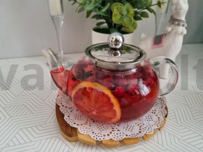 Spanguolių ir raudonųjų apelsinų arbata. pagrindine nuotrauka