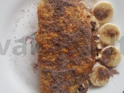 Avižinių dribsnių blynas su bananais ir riešutais pagrindine nuotrauka