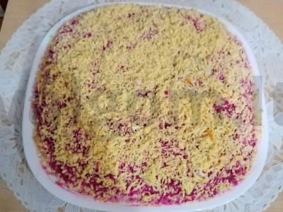 Silkė po šubomis „Šventinė“ pagrindine nuotrauka