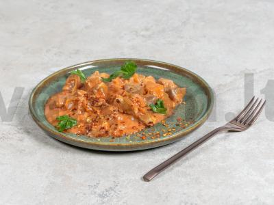 Kiauliena su padažu keptuvėje pagrindine nuotrauka