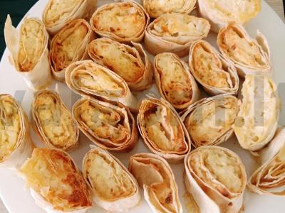 Varškės ritinėliai su olandišku sūriu pagrindine nuotrauka