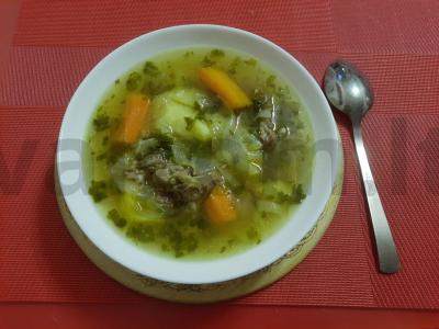 Šuliumas ant avienos kaulų pagrindine nuotrauka