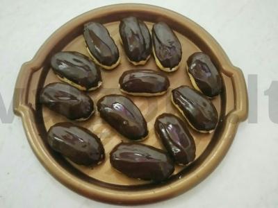 Klasikiniai eklerai su vaniliniu kremu šokoladiniame glajuje pagrindine nuotrauka