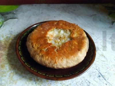 Kopūstų ir bulvių vaflis ant keptuvės pagrindine nuotrauka