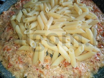 Penne su troškintais pomidorais ir svogūnais Žingsnis 3
