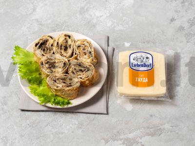 Rulėtas su grybais ir sūriu pagrindine nuotrauka