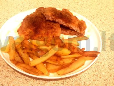 Kepintos kiaulienos šniceliai kukurūzų miltuose pagrindine nuotrauka