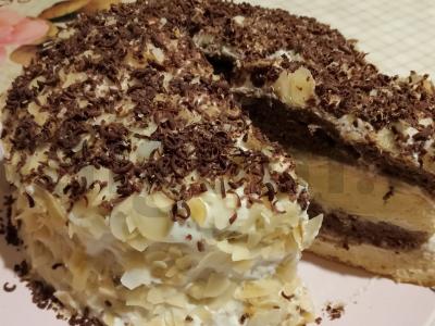 Tortas „Smetannik“ su tamsiu šokoladu pagrindine nuotrauka