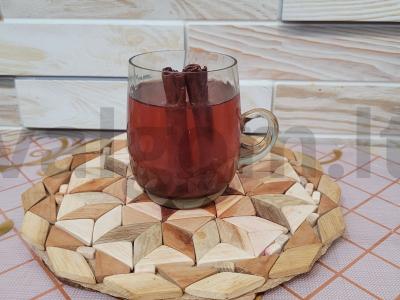 Kvapnus kompotas su džiovintais obuoliais, avietėmis ir cinamonu pagrindine nuotrauka