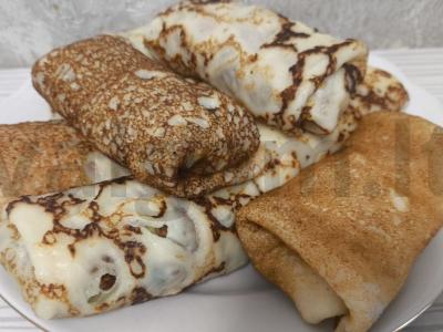 Sotūs blynai su žaliu svogūnu ir kiaušiniu pagrindine nuotrauka