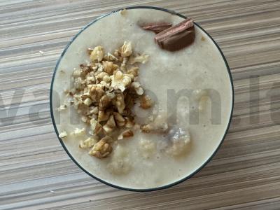 Avižinė košė su razinomis ir graikiniais riešutais pagrindine nuotrauka