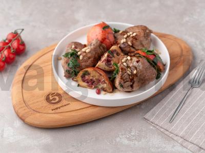 Kiauliena su granatu pagrindine nuotrauka