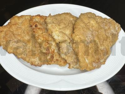 Kiaulienos nugarinės šnicelis vakarienei pagrindine nuotrauka