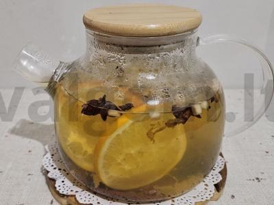 Kvapnus citrusinis arbata su prieskoniais pagrindine nuotrauka