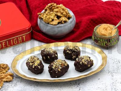 Dattelės šokolade su riešutais pagrindine nuotrauka