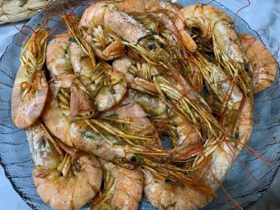 Kepti langustinai su česnaku ir krapais pagrindine nuotrauka