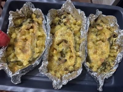 Lašišos steikas, keptas po sūriu pagrindine nuotrauka