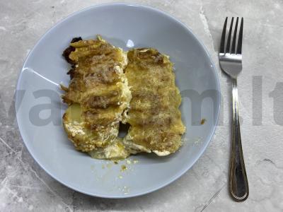 Keptas bulvės su cukinija po sūrio plutele pagrindine nuotrauka