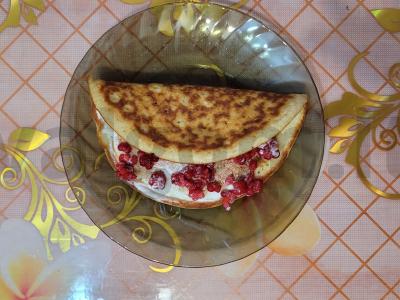 Švelnus ryžių blynas ant rūgštaus pieno pagrindine nuotrauka