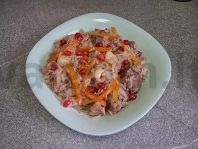 Plovas su kiauliena, basmati ryžiais ir granatu pagrindine nuotrauka