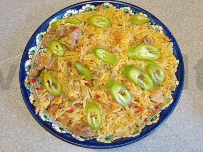 Ilgagrūdžių ryžių plovas su antis filė ir džiovintomis morkomis pagrindine nuotrauka