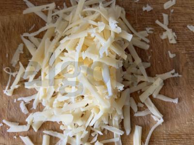 Ryžiai su sūriu ir daržovėmis keptuvėje Žingsnis 6