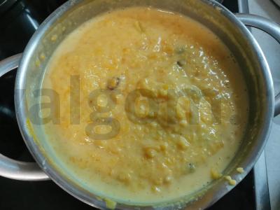 Moliūgų košė su kukurūzų kruopomis ir razinomis pagrindine nuotrauka