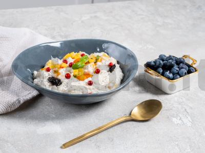 Ryžių košė su moliūgu ir džiovintais vaisiais lėtoje viryklėje pagrindine nuotrauka