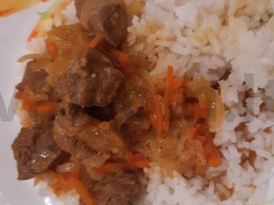 Skani troškinta kiauliena su apelsinu pagrindine nuotrauka