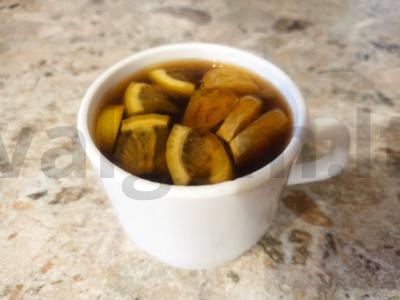 Kavos gėrimas su mandarinų ir citrinos skoniu pagrindine nuotrauka