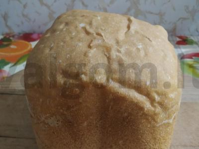 Baltas duona duonos kepimo mašinoje pagrindine nuotrauka