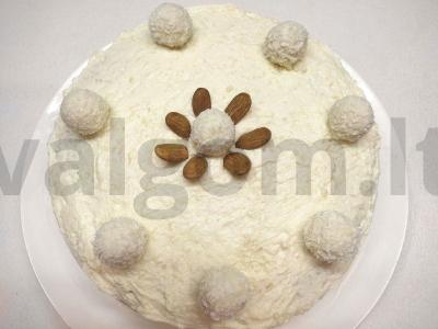 Oro biskvitas su kokosų kremu ir šokoladu apdengtu migdolu pagrindine nuotrauka