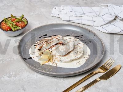 Troškinta kalakutienos filė pasterizuotame piene pagrindine nuotrauka